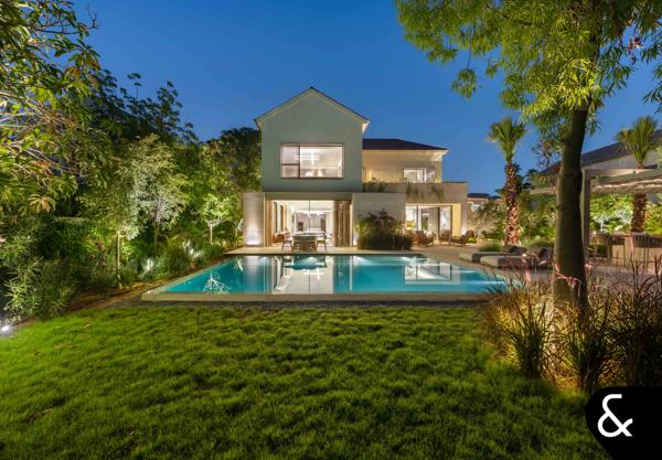 Exclusive - A Rare 15,810 Sq. Ft. Golf-Front Estate